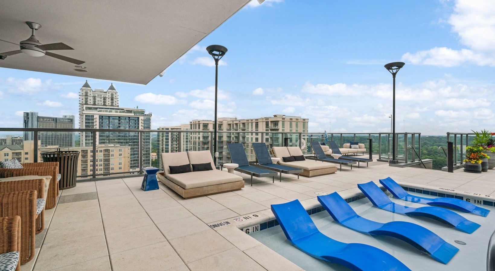 Rooftop Infinity Pool with Lounge Seating