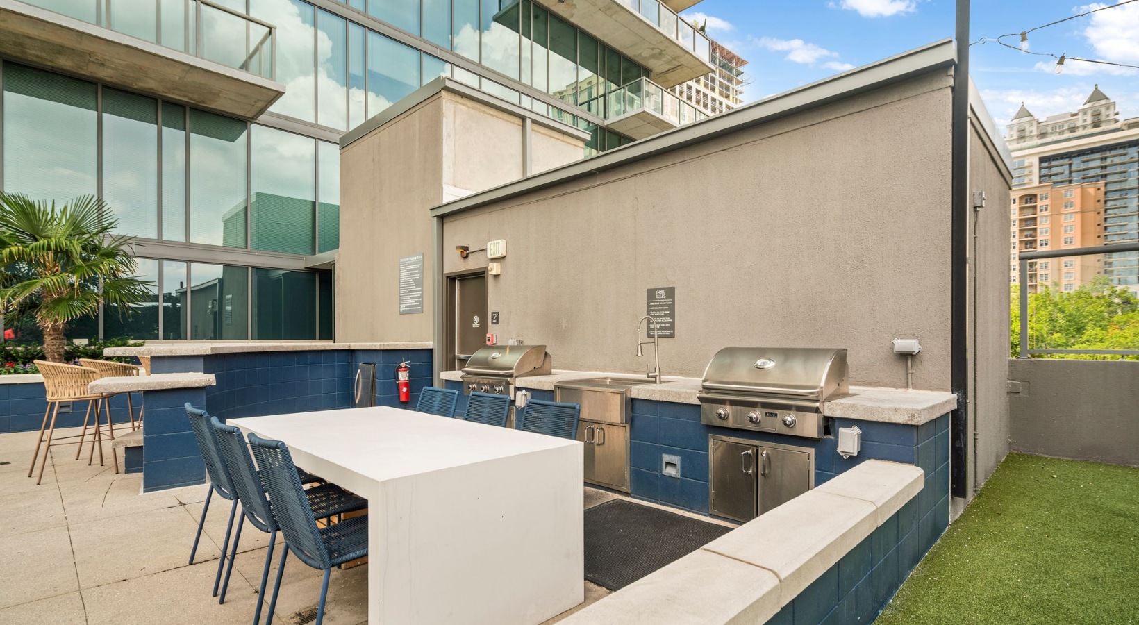 Outdoor Lounge with Fire Pit and Grilling Stations